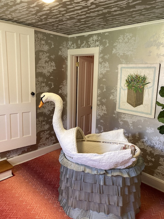 Swan Lullaby, tucked into one of the home&#39;s most diminutive spaces, was designed by Harry Heissmann using a pair of Tillett Textile&#39;s wallpapers. Photos by Hannah Van Sickle