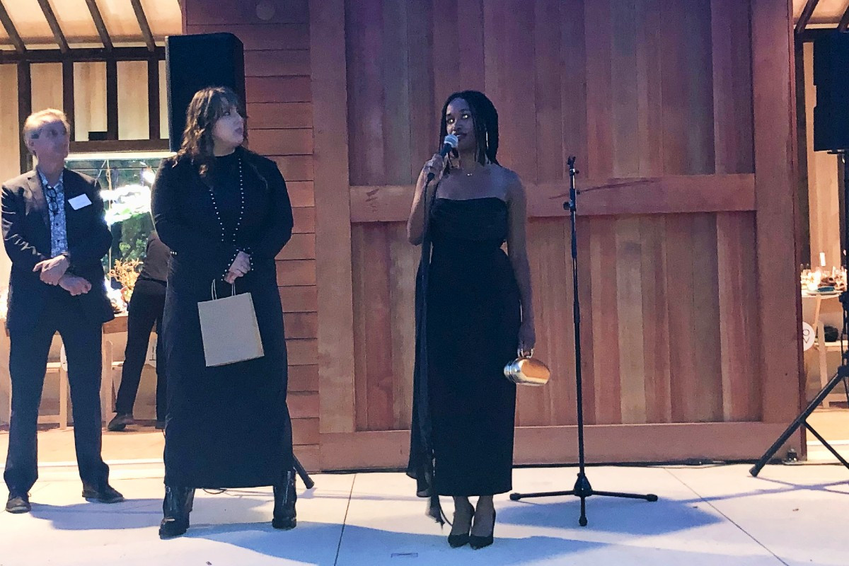 Artist Tschabalala Self (right) speaks to the guests during the honor ceremony. Artist Tschabalala Self (right) speaks to the guests during the honor ceremony.