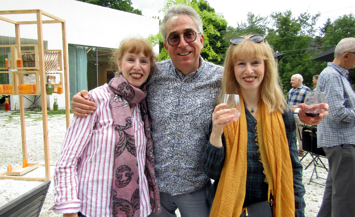 Sisters Marie and Asya Brailovskaia flank their cousin, Alex Tetradze