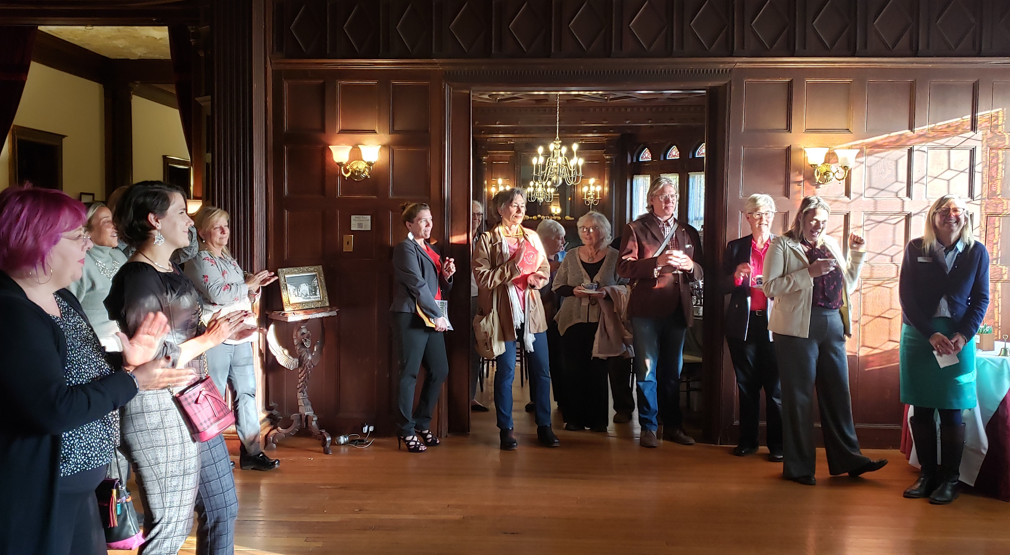 Liana Toscanini, far right, speaks to the crowd of NPC supporters inside Ventfort Hall.