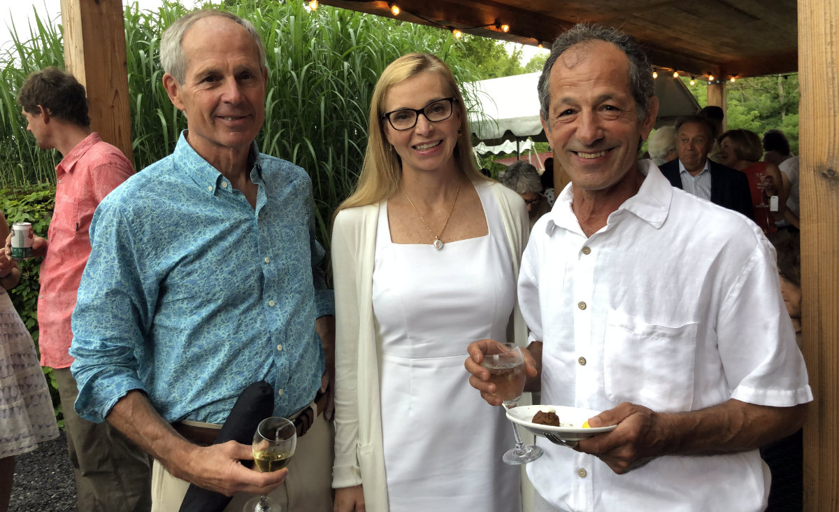 VIM doctors Jack Lyons and Andy Plager flank Pier Boutin, who has been a volunteer doctor in the past