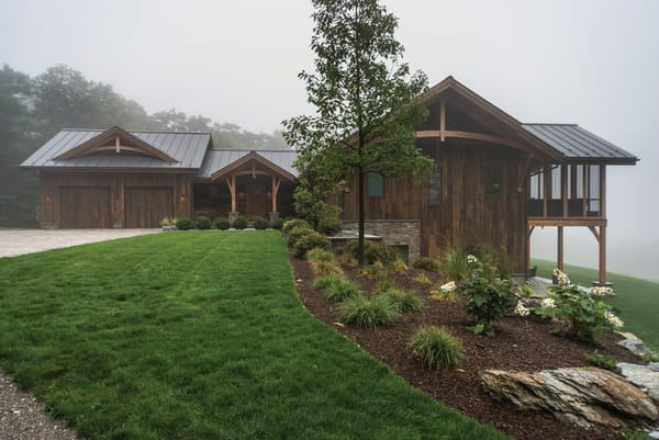 A Timber-Framed Retreat Fulfills A Couple's Dream Atop Bald Mountain