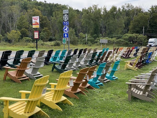 Sitting Pretty In Canaan: Technicolor Chairs Beget A Work Of Art…And A Mystery