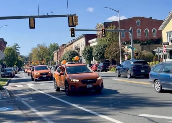 Sunshine Orange Crosstrek Parade: Great Barrington's Unexpected Spectacle
