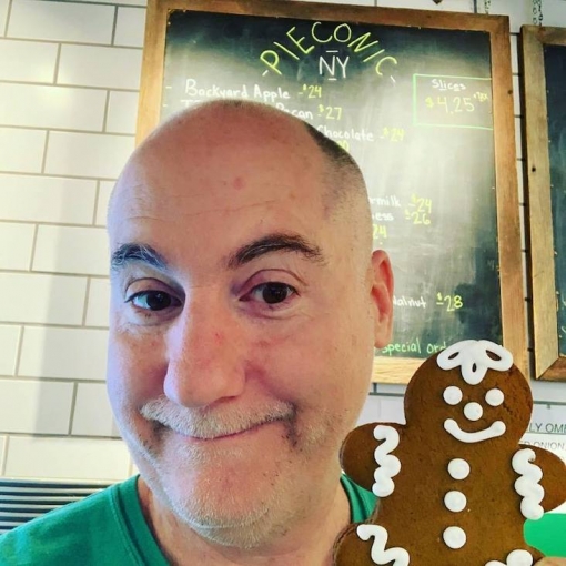 <p><strong>Christopher and a gingerbread cookie</strong></p>