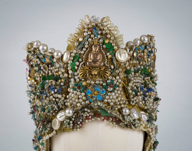 <p>Headdress, 1919 with later additions. Beads, buttons, costume jewelry, and feathers. Photo by David Dashiell.</p>