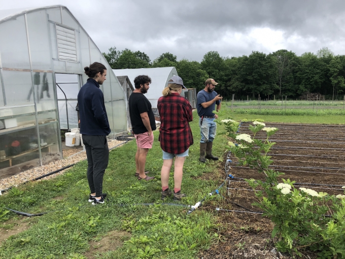 <p>Adam Buggy talks soil, weeds and organic insect control with guests</p>
